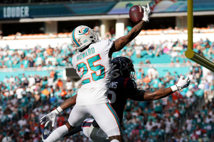 Nov 27, 2022; Miami Gardens, Florida, USA; Miami Dolphins cornerback Xavien Howard (25) breaks up a pass for Houston Texans wide receiver Nico Collins (12) during the second half at Hard Rock Stadium.